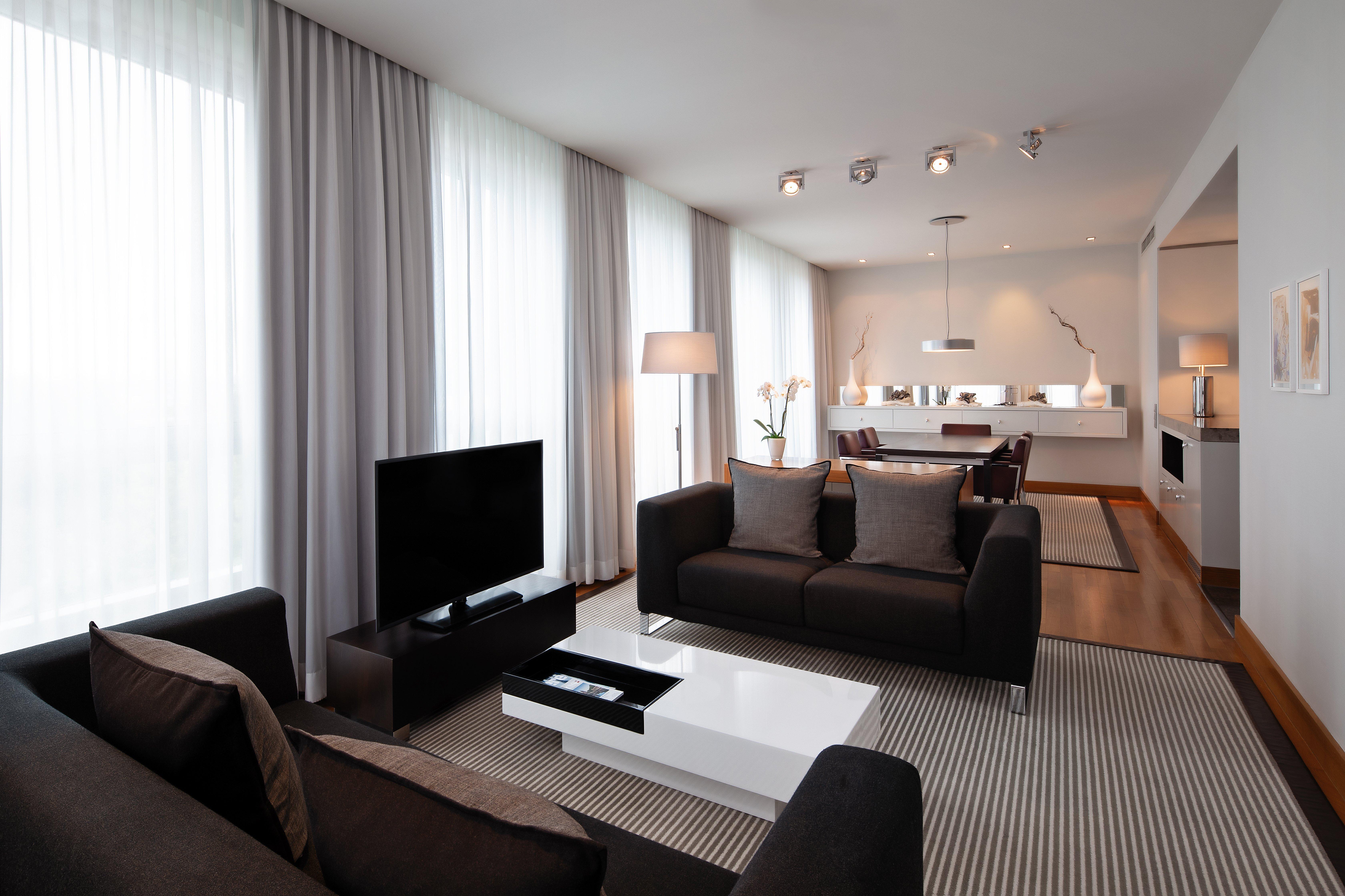 Intercontinental Berlin By Ihg Otel Dış mekan fotoğraf A living room in a serviced apartment in Berlin, Germany