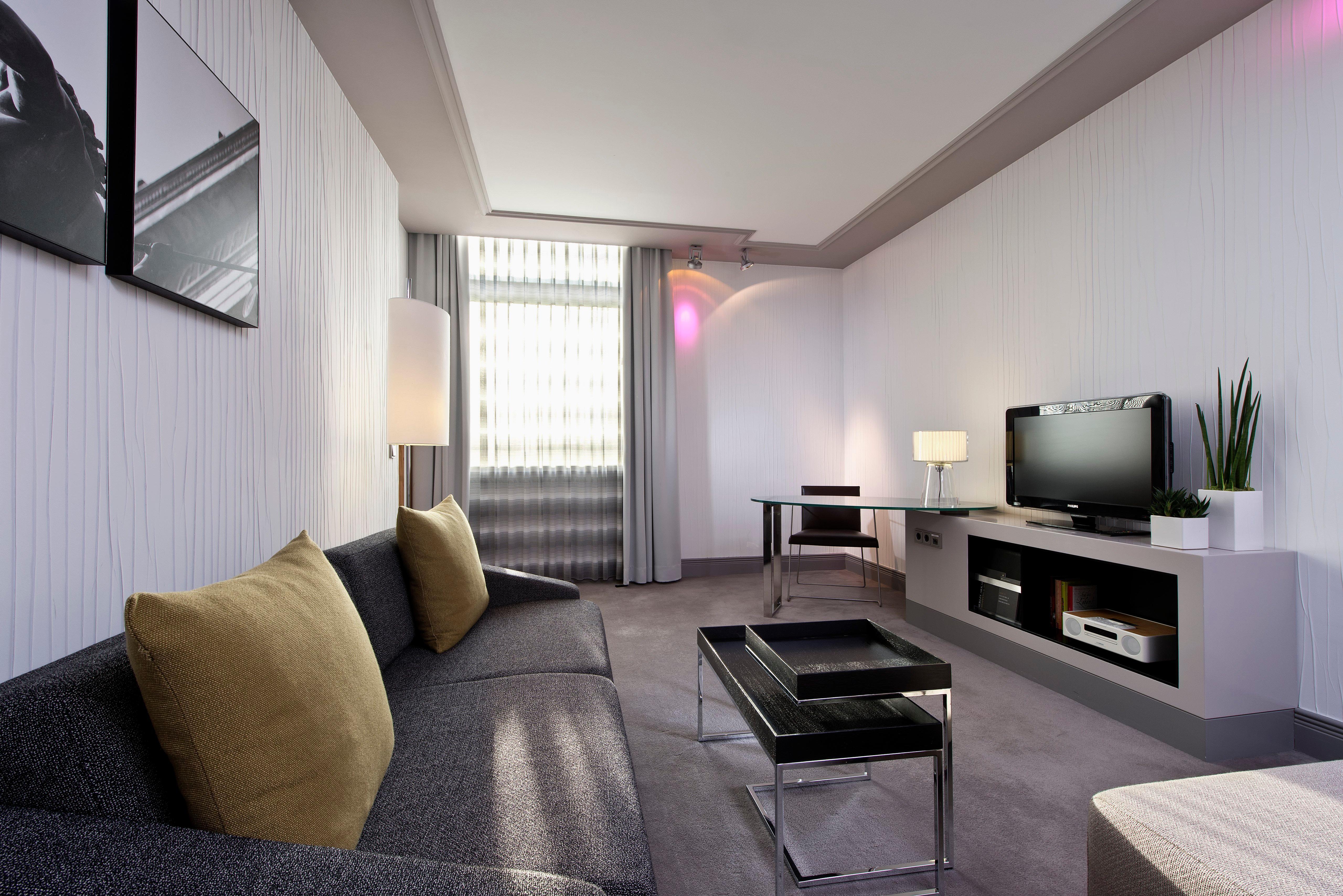 Intercontinental Berlin By Ihg Otel Dış mekan fotoğraf A 3D rendering of a living room